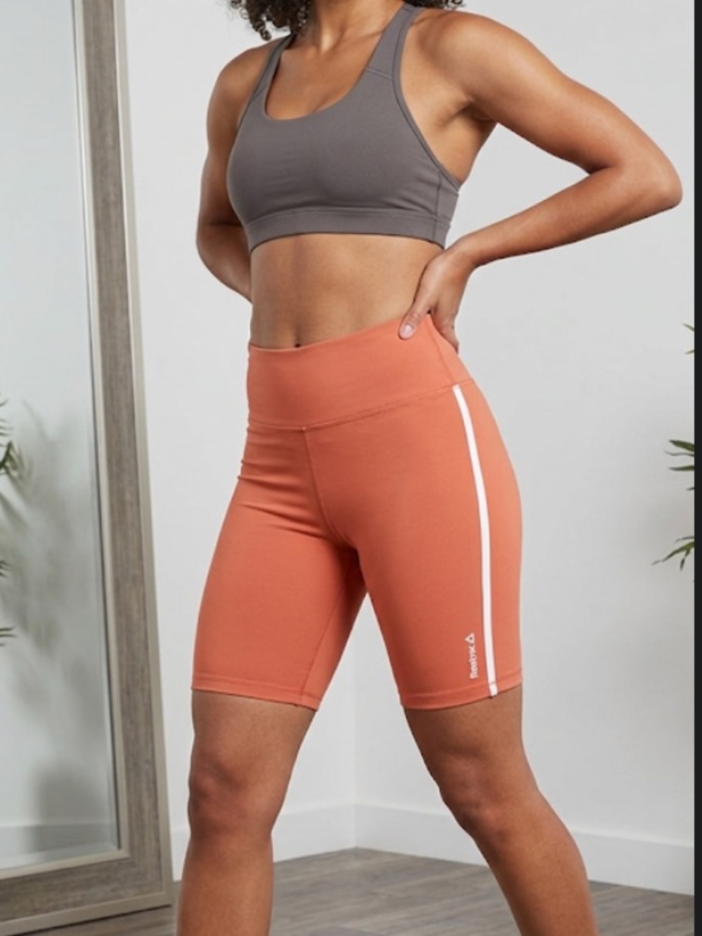 Reebok Women's Athletic Shorts in Bold Orange